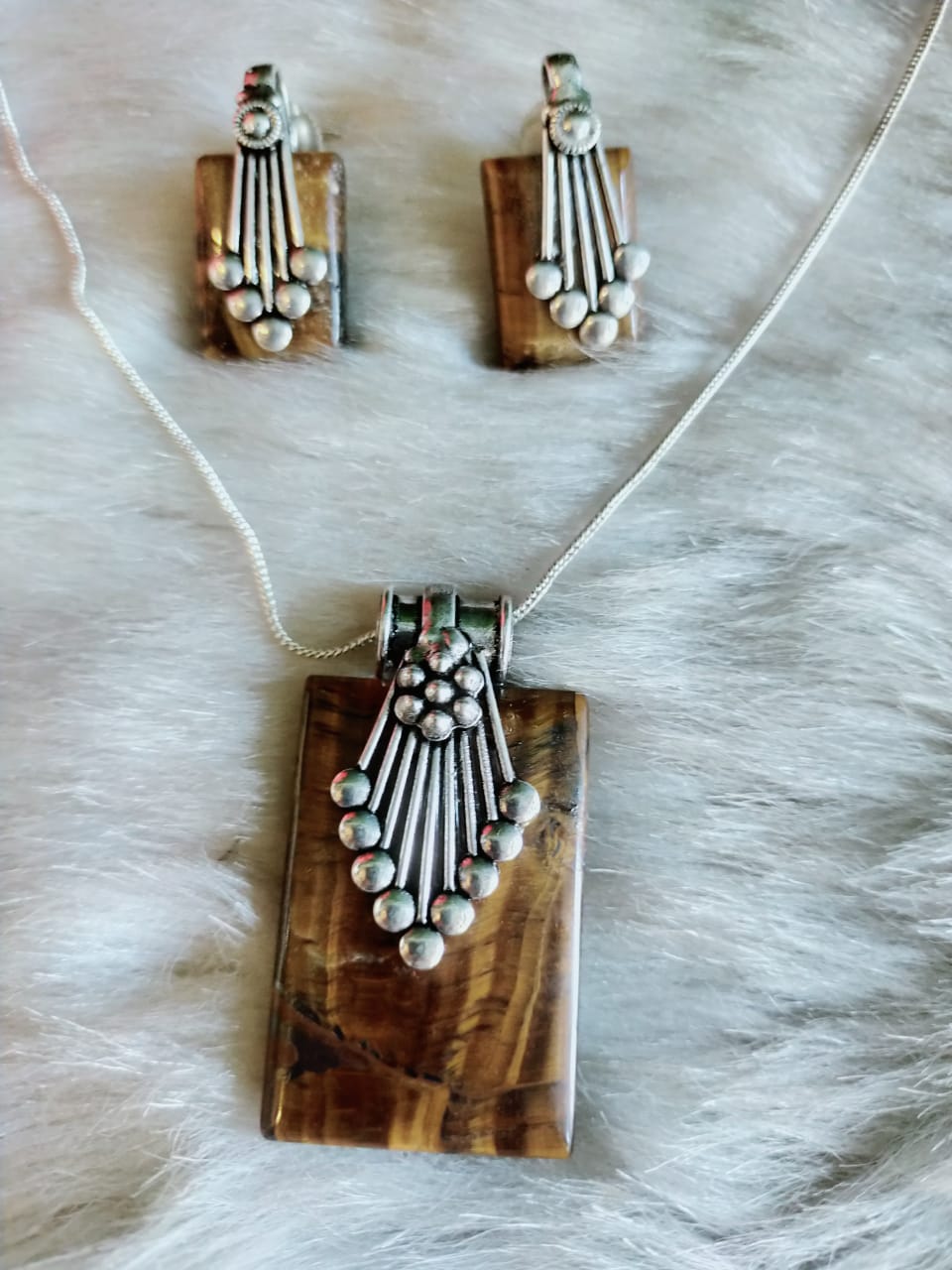 pendant and ear rings